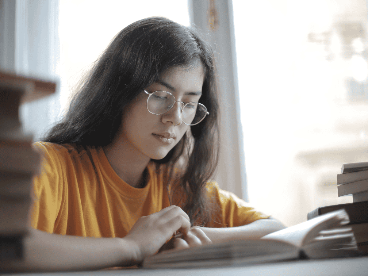 young female reading and preparing for exam