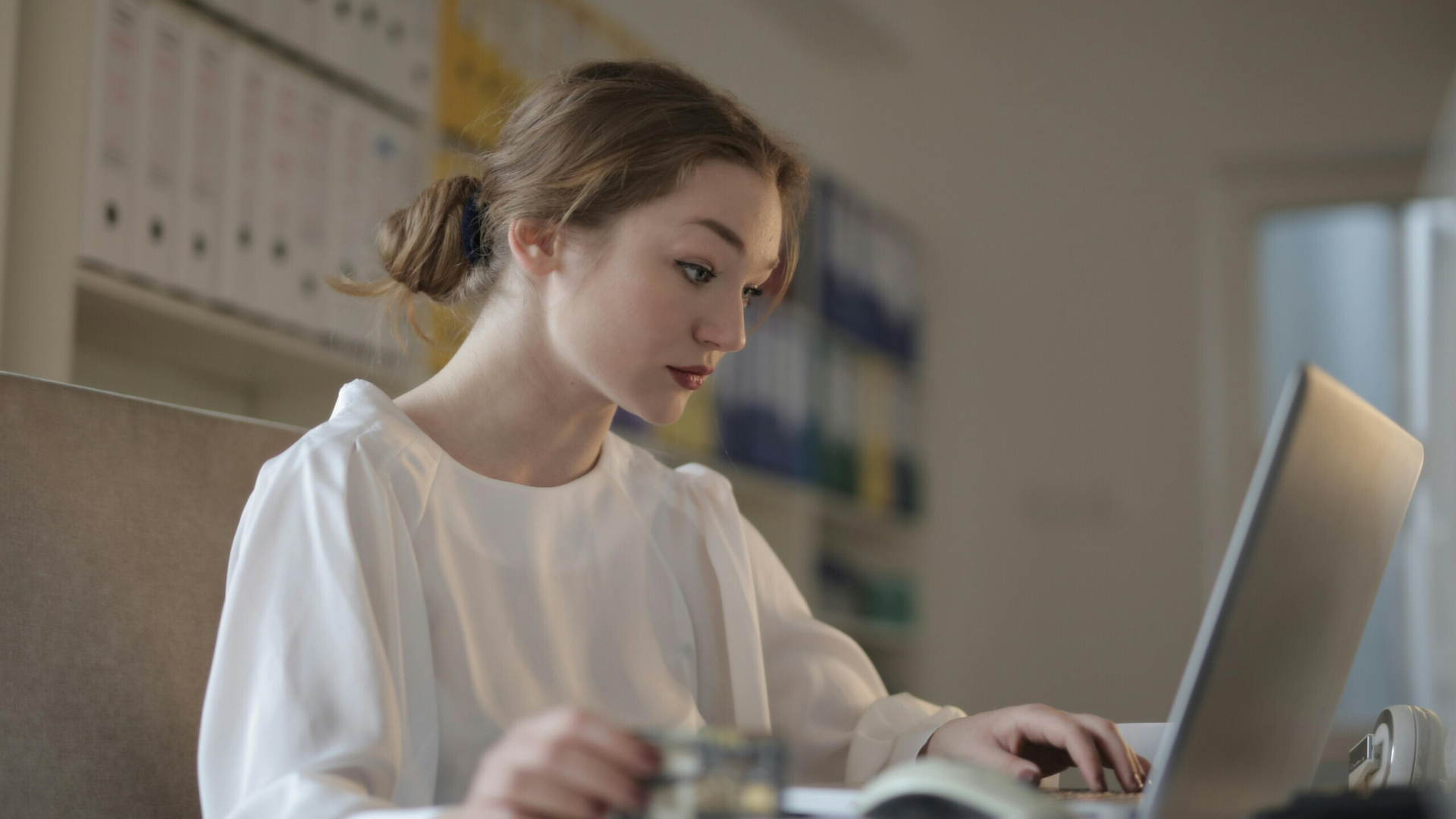 NEC student on laptop