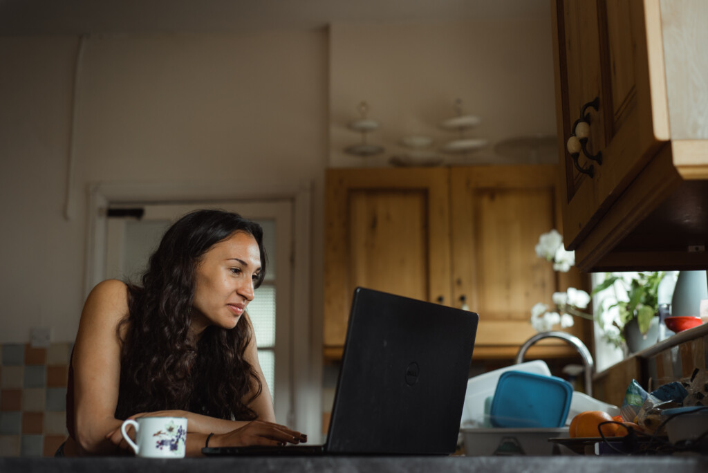 NEC student on laptop