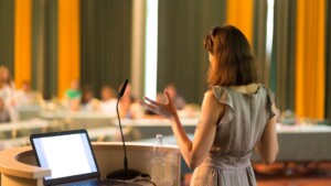 female public educational speaker