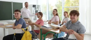 A group of students and their teacher in the classroom