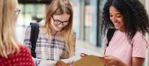 A group of female sudents looking at their exam results